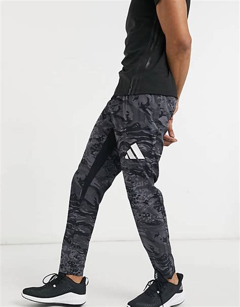 adidas jogginganzug herren camouflage|Adidas 3 bar joggers.